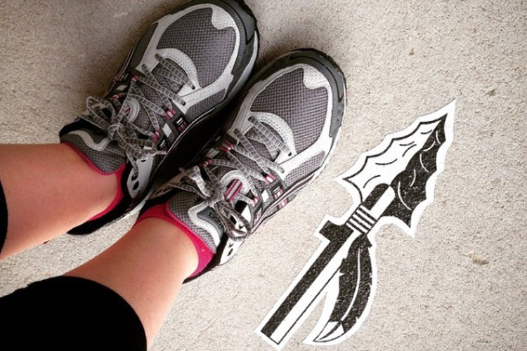 "picture of person's foot and seminole arrowhead"