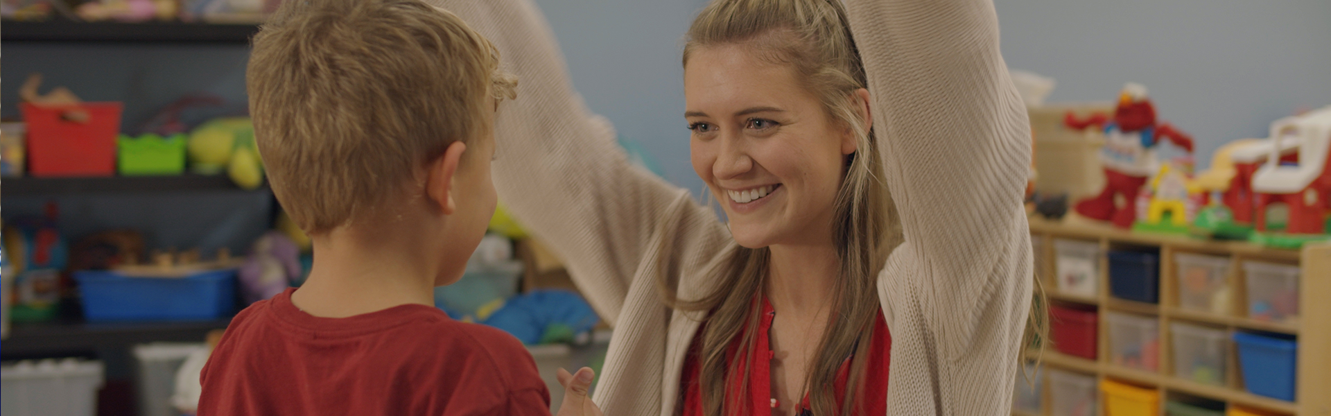 Photo of ECAP clinician working with a child during a session