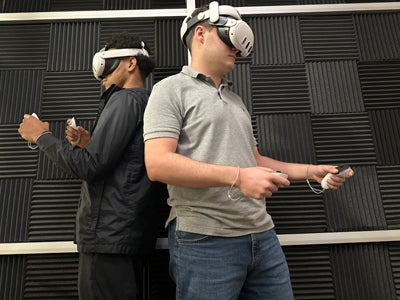 students with virtual reality goggles