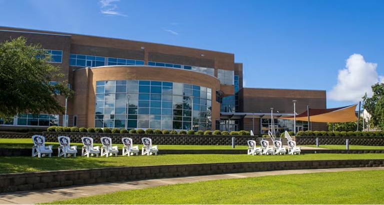 View of the FSU Holly building lawn near the water's edge in Panama City, FL