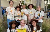 Middle school students pose together at technical competition
