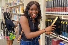 Girl in library 241x161