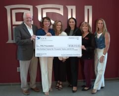 St. Joe presents grant check to Ascent