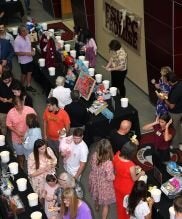 Overhead view of crowd at annual ECAP program auction