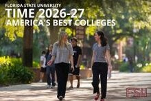 Two women walking on campus