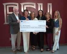 St. Joe presents grant check to Ascent