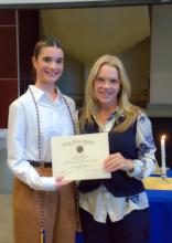 Treasurer Kathryn Devine with certificate