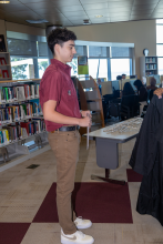 Arriving in library to get robe and instructions 3