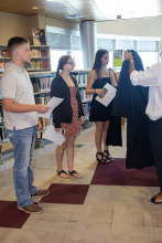 Arriving in library to get robe and instructions 4