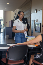 Arriving in library to get robe and instructions 7