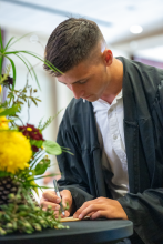 First-Year student signing book 2