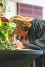 First-Year student signing book 11