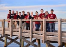 FSU Panama City students pose on campus dock