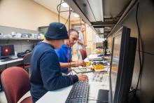 ECE student with faculty