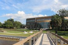 Backyard of the Holley Academic Center from the pier
