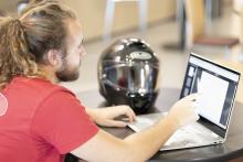 ME Student studies at computer