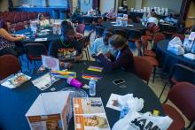 Group table activity, each group receives a plastic bag with the same items to build a raft. Groups are challenged to be able to place at least 50 pennies on the float before it sinks. Participants are encouraged to test their designs, regroup, retest, all a process of engineering.