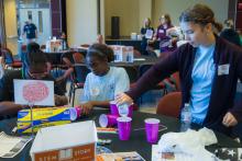 Group table activity, each group receives a plastic bag with the same items to build a raft. Groups are challenged to be able to place at least 50 pennies on the float before it sinks. Participants are encouraged to test their designs, regroup, retest, all a process of engineering.