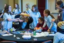 Group table activity, each group receives a plastic bag with the same items to build a raft. Groups are challenged to be able to place at least 50 pennies on the float before it sinks. Participants are encouraged to test their designs, regroup, retest, all a process of engineering.