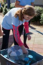 Group table activity, each group receives a plastic bag with the same items to build a raft. Groups are challenged to be able to place at least 50 pennies on the float before it sinks. Participants are encouraged to test their designs, regroup, retest, all a process of engineering.