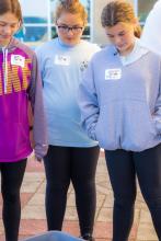 Group table activity, each group receives a plastic bag with the same items to build a raft. Groups are challenged to be able to place at least 50 pennies on the float before it sinks. Participants are encouraged to test their designs, regroup, retest, all a process of engineering.