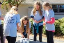 Group table activity, each group receives a plastic bag with the same items to build a raft. Groups are challenged to be able to place at least 50 pennies on the float before it sinks. Participants are encouraged to test their designs, regroup, retest, all a process of engineering.