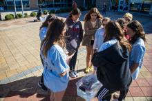 Group table activity, each group receives a plastic bag with the same items to build a raft. Groups are challenged to be able to place at least 50 pennies on the float before it sinks. Participants are encouraged to test their designs, regroup, retest, all a process of engineering.