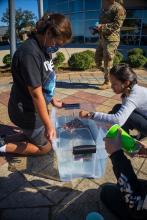 Group table activity, each group receives a plastic bag with the same items to build a raft. Groups are challenged to be able to place at least 50 pennies on the float before it sinks. Participants are encouraged to test their designs, regroup, retest, all a process of engineering.