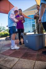 Group table activity, each group receives a plastic bag with the same items to build a raft. Groups are challenged to be able to place at least 50 pennies on the float before it sinks. Participants are encouraged to test their designs, regroup, retest, all a process of engineering.