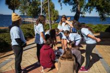 Group table activity, each group receives a plastic bag with the same items to build a raft. Groups are challenged to be able to place at least 50 pennies on the float before it sinks. Participants are encouraged to test their designs, regroup, retest, all a process of engineering.