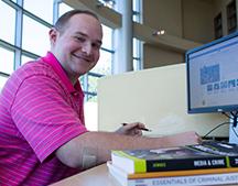 Student studies at Library Learning Center