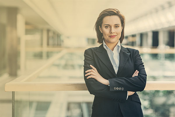 confident businesswoman in building atrium