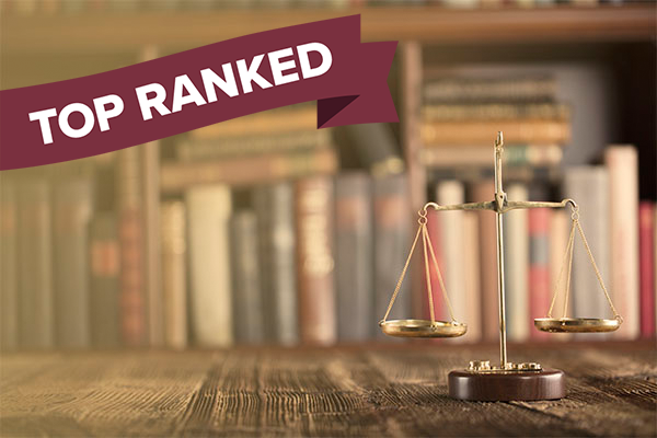 scales of justice with bookshelf in background and "top ranked" banner