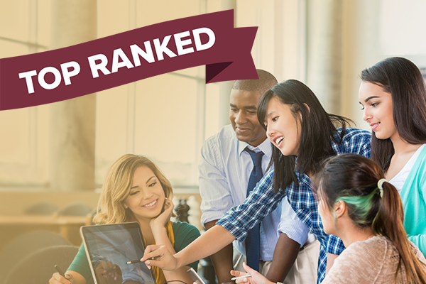 group of students collaborating at computer and "top ranked" banner